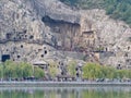 Luoyang Longmen grottoes. Broken Buddha and the stone caves and sculptures in the Longmen Grottoes in Luoyang, China. Taken in