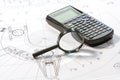 Lupe with plan und calculator Royalty Free Stock Photo