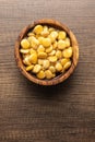 Lupini beans in brine. Pickled lupin in wooden bowl on kitchen table. Top view Royalty Free Stock Photo