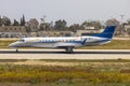 Business Jet landing in crosswind