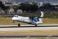 Twin turboprop airliner taking off