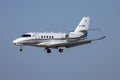 Business Jet landing in the afternoon sun