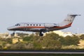Maltese Registered Business Jet on short finals Royalty Free Stock Photo