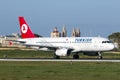Luqa, Malta 14 January 2015: Turkish Airlines Airbus A320 on runway 31. Royalty Free Stock Photo