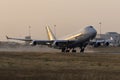 Luqa, Malta 24 June 2015: Cargo plane 747 taking off just before sunset. Royalty Free Stock Photo