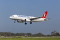 Luqa, Malta 25 March 2015: Turkish Airlines Airbus A320-232 on finals runway 31. Royalty Free Stock Photo