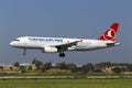 Luqa, Malta 25 March 2015: Turkish Airlines Airbus A320-232 on finals runway 31. Royalty Free Stock Photo