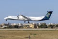 Greek turboprop airliner coming in to land Royalty Free Stock Photo