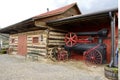 Steam Engine and Log Cabin at Luray Valley Museum. Luray, VA, USA. April 10, 2015.