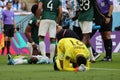 Mohammed Al Owais cries when injuring his partner during the match between Argentina National Team vs. Saudi Arabia National Team