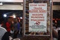 A poster in a shop calling for stopping illegal poaching and ivory trafficking