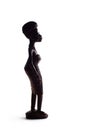 LUSAKA, ZAMBIA - NOVEMBER 2013: Typical examples of African art - Silhouette of African Statue of Girl Knee Length Over White