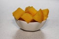 Fresh cut mango in a dish