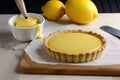 luscious lemon curd filling in delicate pastry crust for tart and sweet dessert