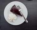 Luscious piece of dark chocolate cake with whipped cream, Austria