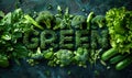 Lush arrangement of green vegetables and herbs creatively spelling GREEN, highlighting fresh produce, healthy eating, and Royalty Free Stock Photo