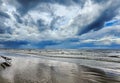 Lush cumulus clouds over Baltic sea in Jurmala, Latvia. Royalty Free Stock Photo