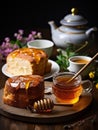 Lush fresh buns with honey and tea on the table. AI Royalty Free Stock Photo