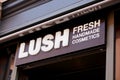 Lush fresh handmade cosmetics logo sign and text brand front of store of beauty