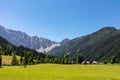 Bodental - Lush green alpine meadow of Maerchenwiese with panoramic view of Karawanks