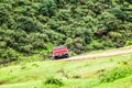 Lush green landscape, trees and foggy mountains in Ayn Khor tourist resort, Salalah, Oman