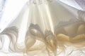 Lush hem bottom of the wedding dress, cloaks and ruches Royalty Free Stock Photo