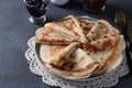 Lush homemade pancakes with wheat flour, eggs and yogurt, served with berries jam on gray background Royalty Free Stock Photo