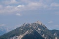 Lussari - Panoramic view of mountain peak Jof di Miezegnot in untamed Julian Alps