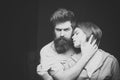 Lust. Fashion shot of couple after haircut. Hairstyle concept. Man with stylish beard and mustache and girl with fresh