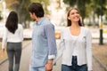 Boyfriend Looking At Other Woman Walking With Girlfriend In Park Royalty Free Stock Photo