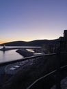 Lustica Bay lighthouse at sunset