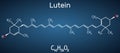 Lutein, xanthophyll molecule. It is type of carotenoid. Structural chemical formula on the dark blue background