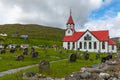 Lutheran Church With Red Roof in Sandavagur village, Located On The Faroe Islands, Denmark