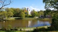 Lutheran Church and a small body of water in the Latvian village of Aizpute in May 2020