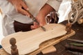 The luthier builds a medieval stringed instrument