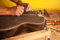Luthier hands  making a classical guitar Royalty Free Stock Photo