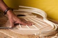 Luthier   working  on the process of making a new classical guitar Royalty Free Stock Photo