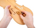 Luthier using small hand plane