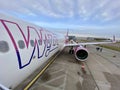 Luton Airport, England, February 10, 2022. Wizzair Aircraft, Pink and White.