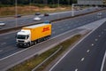 DHL lorry in motion on British motorway M1 Royalty Free Stock Photo