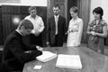 Priest is signing significant document