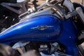 Closeup of blue tank of suzuki intruder motorbike parked in the street Royalty Free Stock Photo