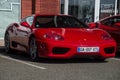 Front view of red Ferrari 360 Modena convertible car parked in the street Royalty Free Stock Photo