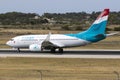 Luxair 737 backtracking runway 31. Royalty Free Stock Photo