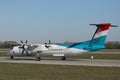 Luxair plane doing taxi on taxiway, back view