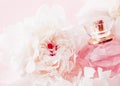 Luxe fragrance bottle as girly perfume product on background of peony flowers, parfum ad and beauty branding Royalty Free Stock Photo