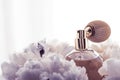 Luxe fragrance bottle as vintage perfume product on violet background and peony flowers, parfum ad and beauty branding