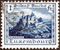 LUXEMBOURG - CIRCA 1921: A stamp printed in Luxembourg shows Vianden Castle, circa 1921.