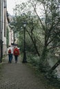 People walking past river Alzette in Luxembourg City, Luxembourg