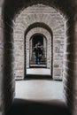 Man and woman walking inside Bock Casemates in Luxembourg City